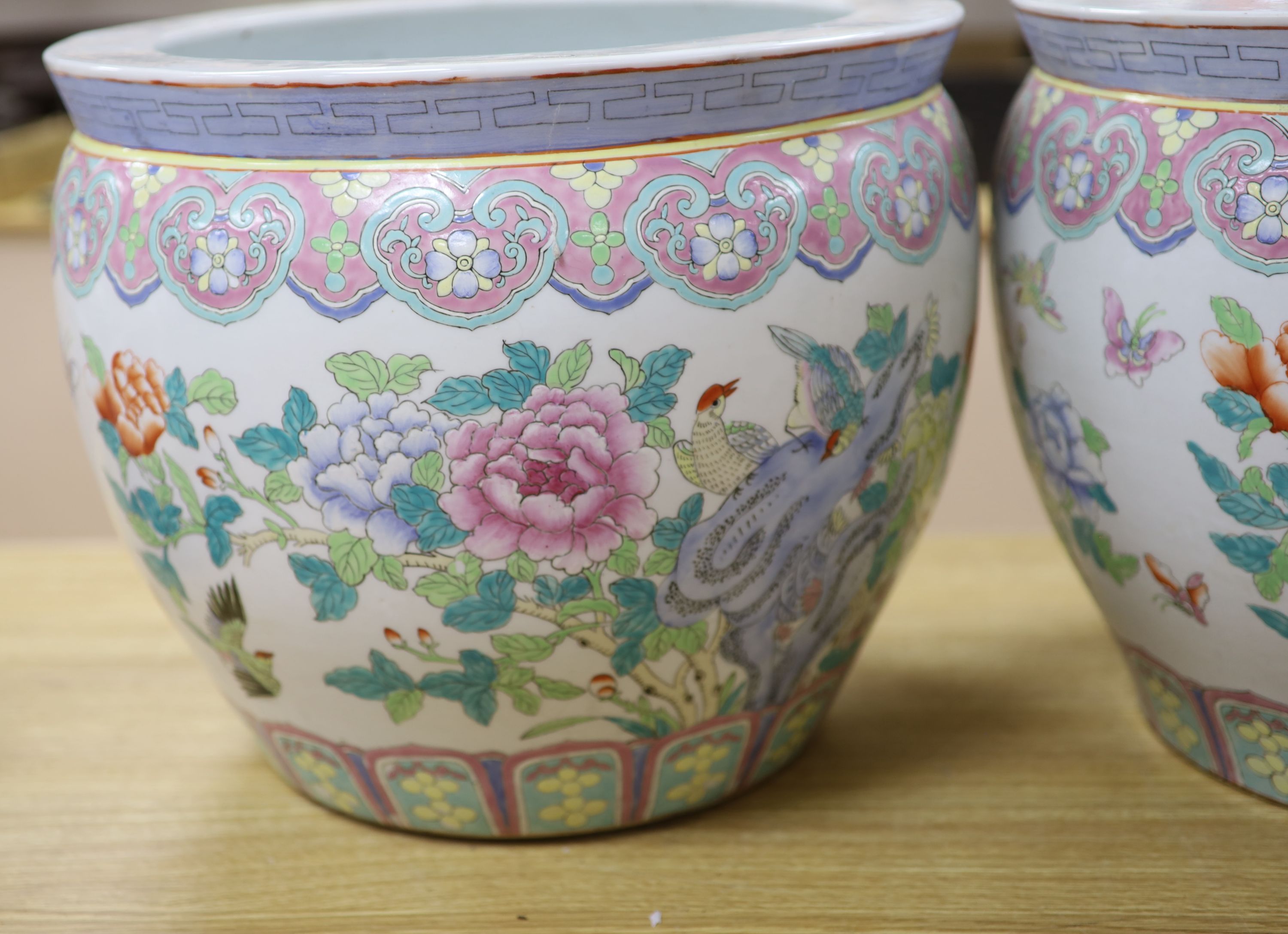 A pair of Chinese famille rose jardinieres, diameter 41cm